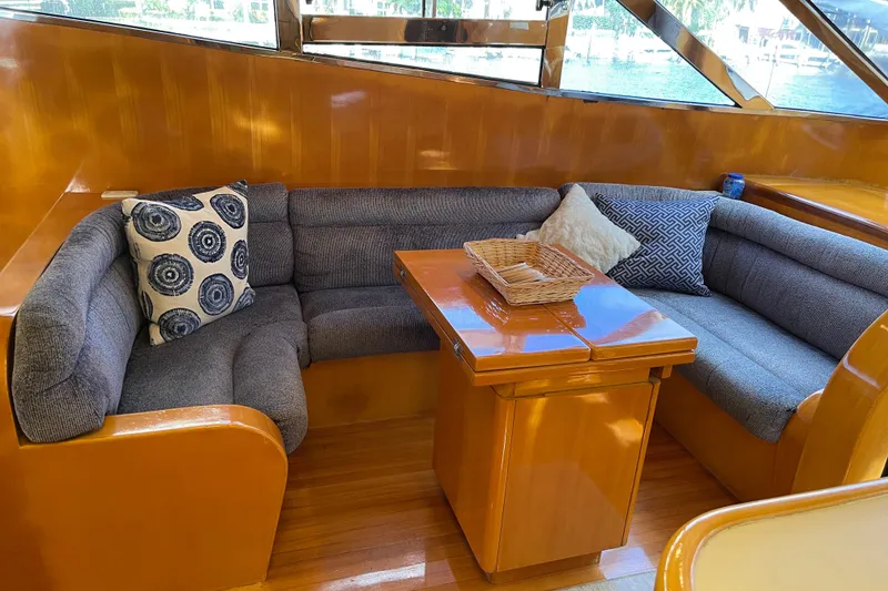 Slide: The Image of Luxurious interior of 1995 JOHNSON 65 Flybridge Motoryacht with TV and wooden cabinetry. - 64