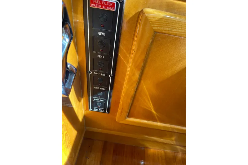 Slide: The Image of Control panel of a 1995 JOHNSON 65 Flybridge Motoryacht with joystick and keyboard. - 90