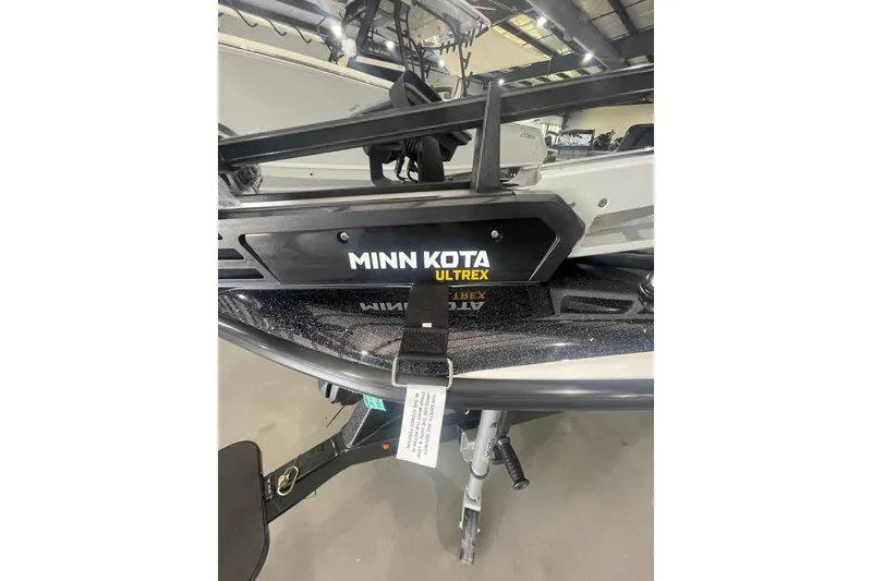 Slide: The Image of 2026 Skeeter ZXR20 SE with Minn Kota Ultrex trolling motor in a showroom. - 16