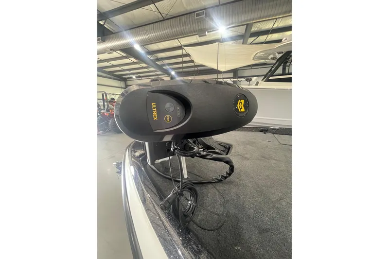 Slide: The Image of Trolling motor on 2026 Skeeter ZXR20 SE boat in a showroom setting. - 3