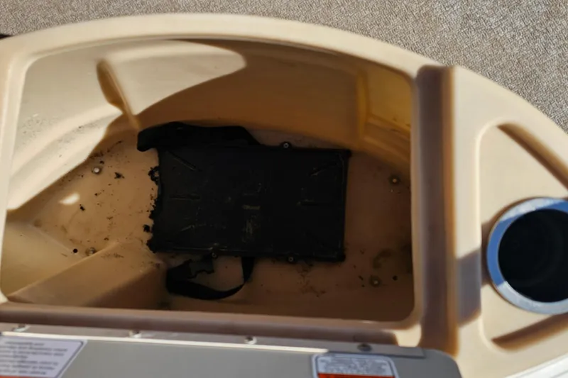 Slide: The Image of Storage compartment of 2016 Sun Tracker Fishin' Barge 22 DLX boat. - 10