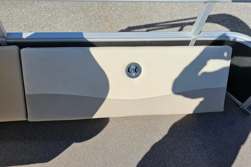 Slide: The Image of 2016 Sun Tracker Fishin' Barge 22 DLX seat with shadow and latch detail. - 17