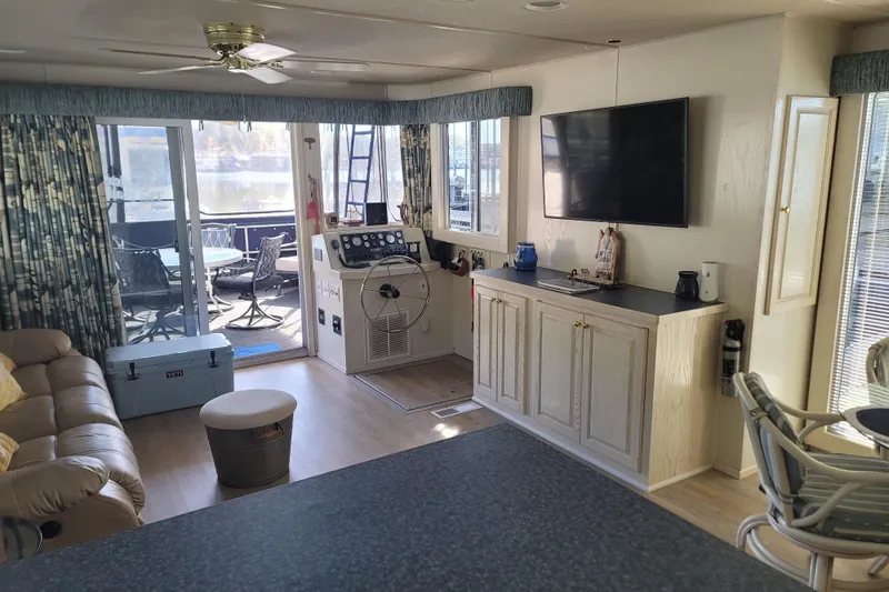 Slide: The Image of Interior of 2002 Fantasy 16 X 68 houseboat with modern amenities and lake view. - 26