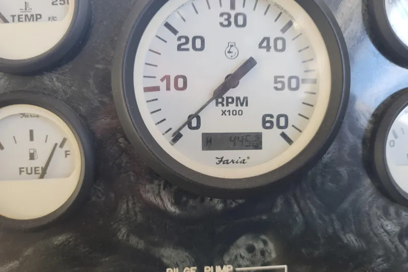 Slide: The Image of Close-up of a 2002 Fantasy 16 X 68 Houseboat RPM and fuel gauges. - 31