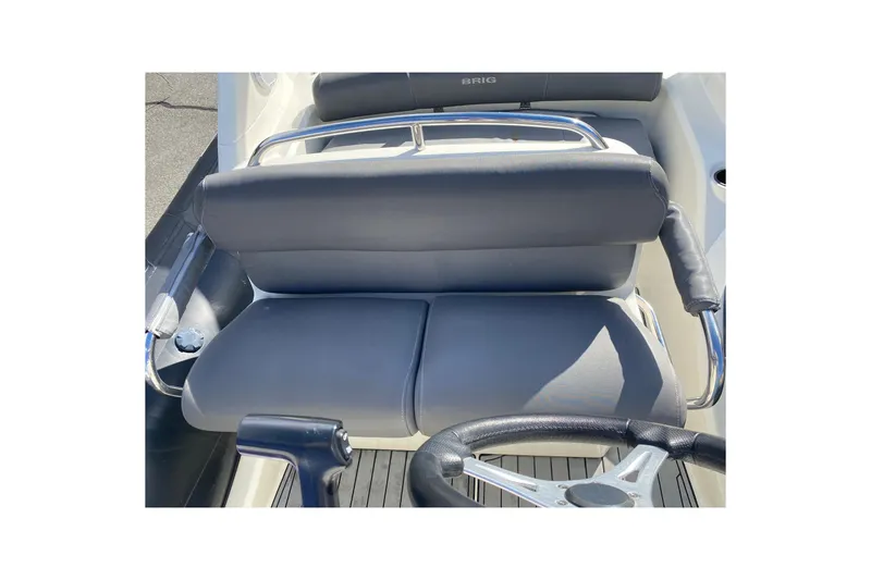 Slide: The Image of Yamaha tachometer displaying 310.9 hours on a 2019 Brig Eagle 650 boat. - 12