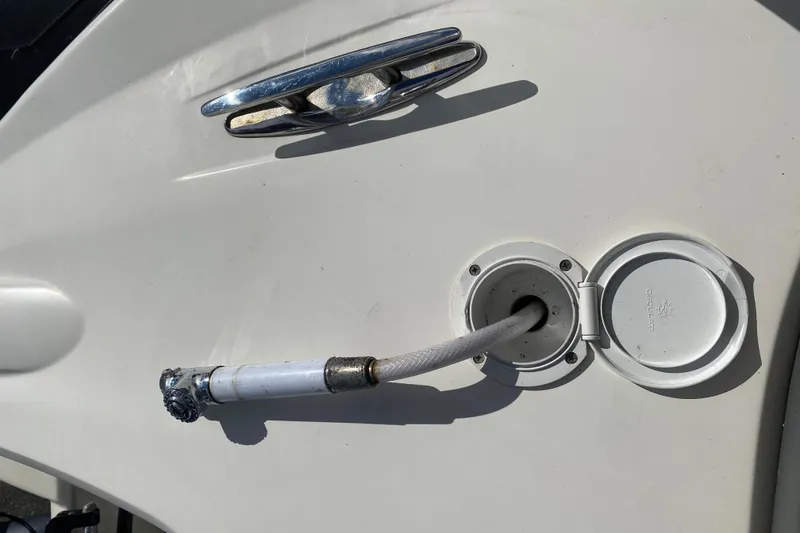 Slide: The Image of 2019 Brig Eagle 650 boat seat with visible wear and tear. - 13