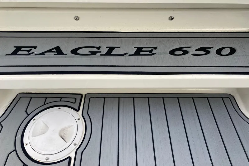 Slide: The Image of 2019 Brig Eagle 650 boat seat and steering wheel, featuring sleek design and comfortable seating. - 14