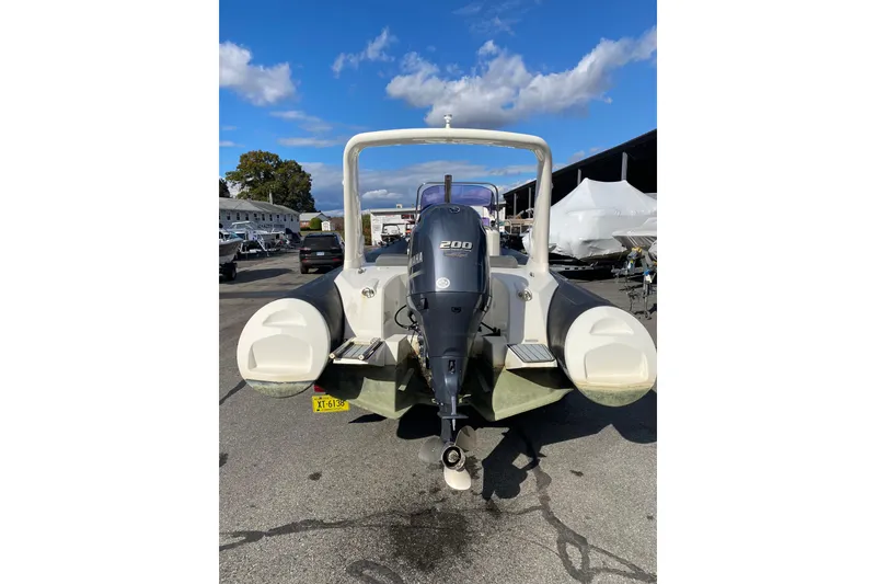 Slide: The Image of 2019 Brig Eagle 650 boat on trailer in indoor storage facility. - 2