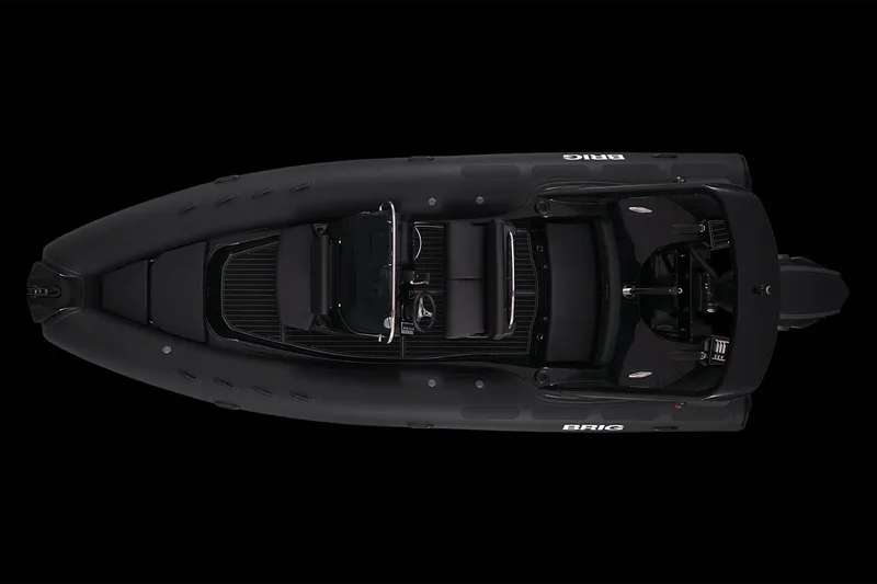 Slide: The Image of 2019 Brig Eagle 650 boat covered on a trailer, parked outdoors. - 21