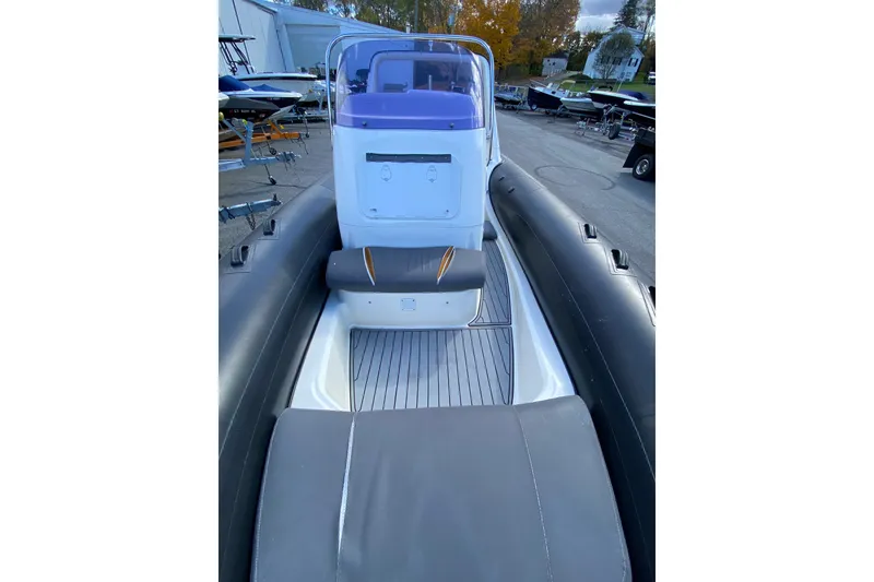 Slide: The Image of 2019 Brig Eagle 650 boat with Yamaha engine on trailer in indoor setting. - 3