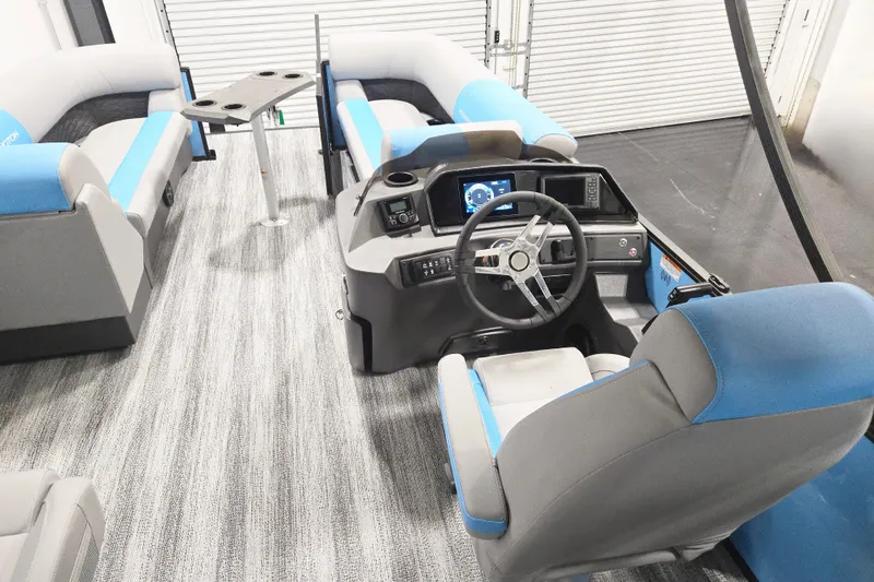 Slide: The Image of Interior of 2026 Bennington 23SSRSF pontoon boat with modern helm and seating. - 4