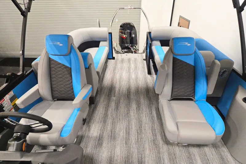 Slide: The Image of 2026 Bennington 23SSRSF pontoon boat interior with blue and gray seating. - 5