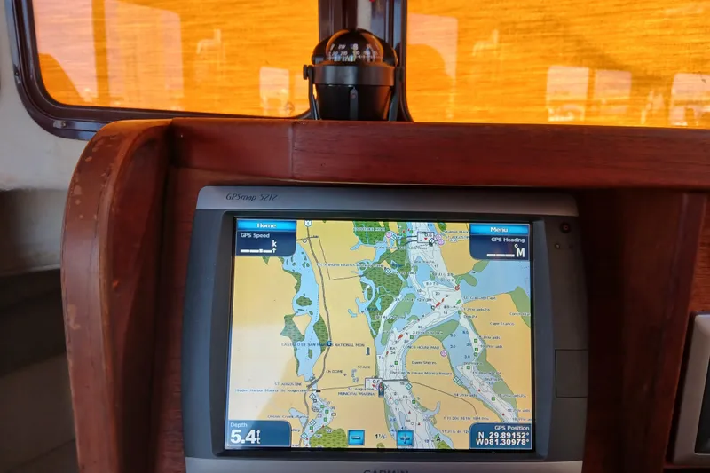 Slide: The Image of GPS navigation screen on 2009 Ranger Tugs R-25 boat, displaying a detailed marine map. - 29