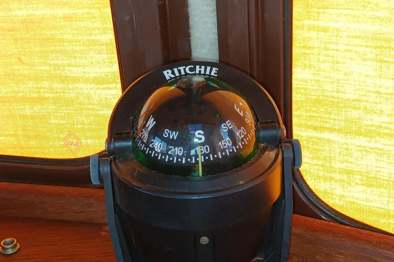 Slide: The Image of Ritchie compass on 2009 Ranger Tugs R-25 boat, showing south direction. - 30