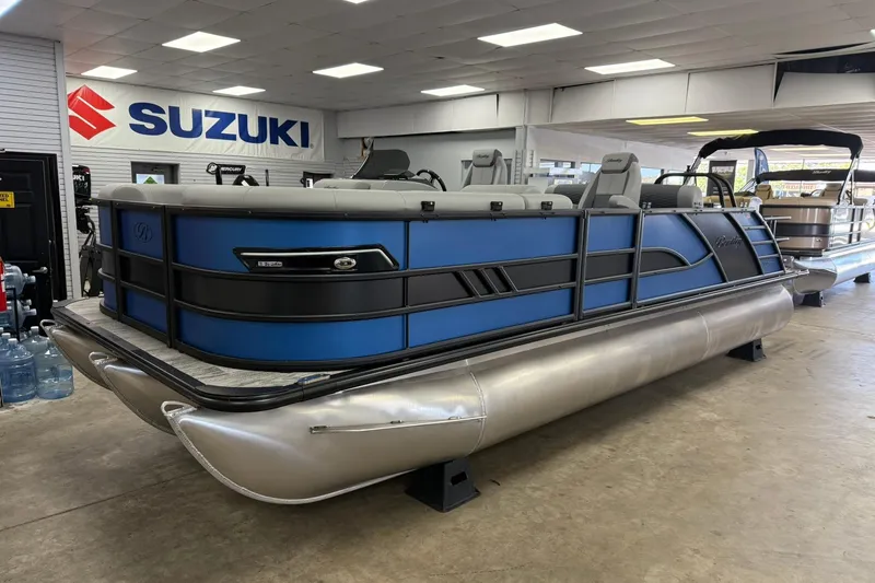 The Image of 2026 Bentley Pontoons Elite 223 Swingback in showroom, featuring sleek blue design. - 0