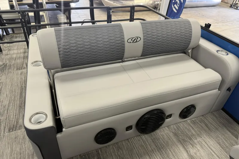 Slide: The Image of 2026 Bentley Pontoons Elite 223 Swingback seating with cup holders and speakers. - 11