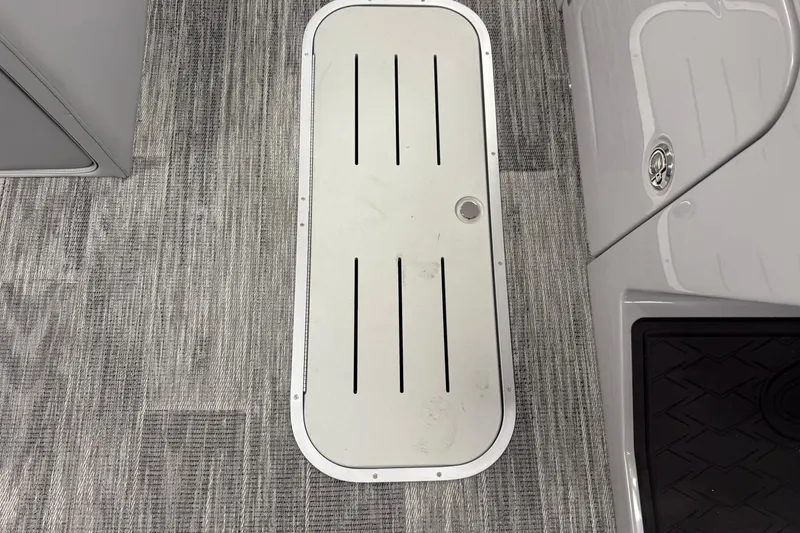 Slide: The Image of 2026 Bentley Pontoons Elite 223 Swingback deck with sleek, modern flooring design. - 4