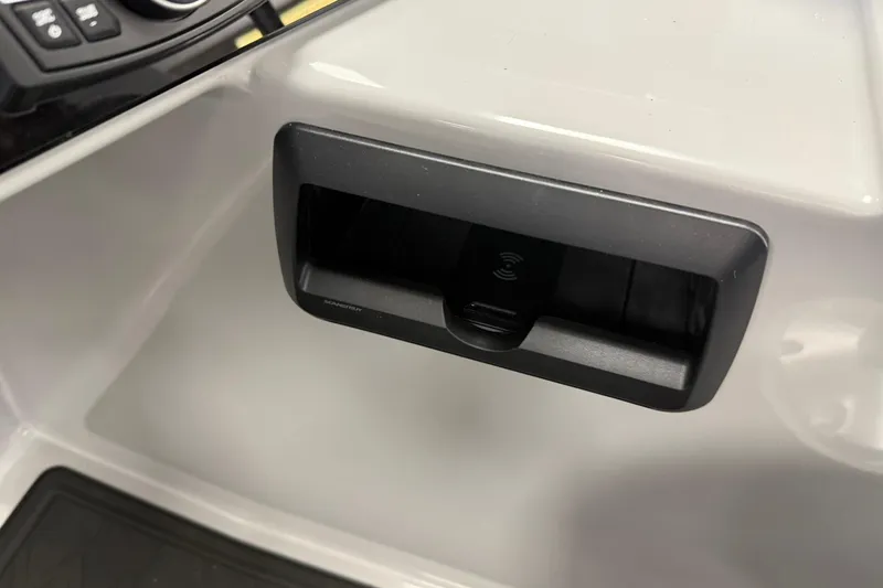Slide: The Image of 2026 Bentley Pontoons Elite 223 Swingback wireless charging dock detail. - 9