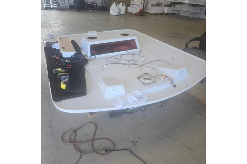 Slide: The Image of 2026 Albury Brothers 27 boat in a workshop, side view. - 3