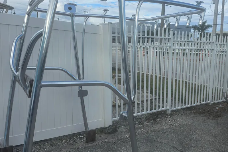 Slide: The Image of 2026 Albury Brothers 27 boat interior, showcasing spacious deck and storage compartments. - 4