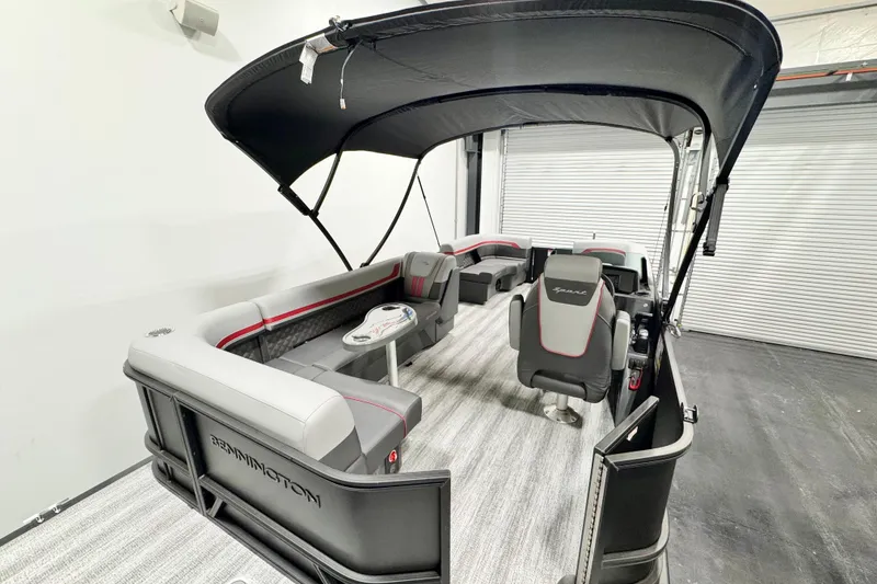 Slide: The Image of Interior of 2026 Bennington 20S Cruise with sleek table and cup holders. - 4