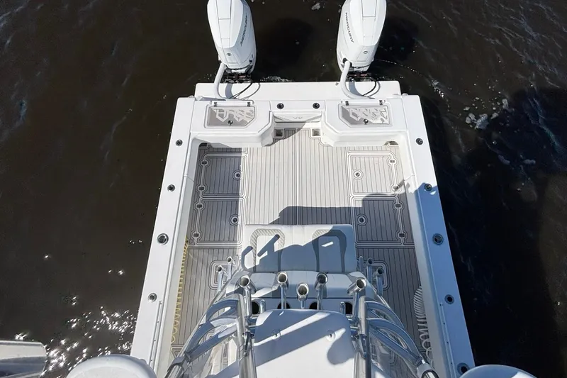 Slide: The Image of Top view of 2020 Custom HHH 35LX Catamaran deck with dual outboard motors. - 13