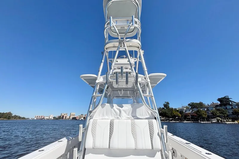 Slide: The Image of Custom HHH 35LX Catamaran 2020 on water, featuring sleek design and clear blue sky. - 17