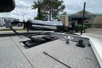 Slide: The Image of 2020 Tracker Pro Team 195 TXW Tournament Edition boat dashboard with steering wheel and gauges. - 4