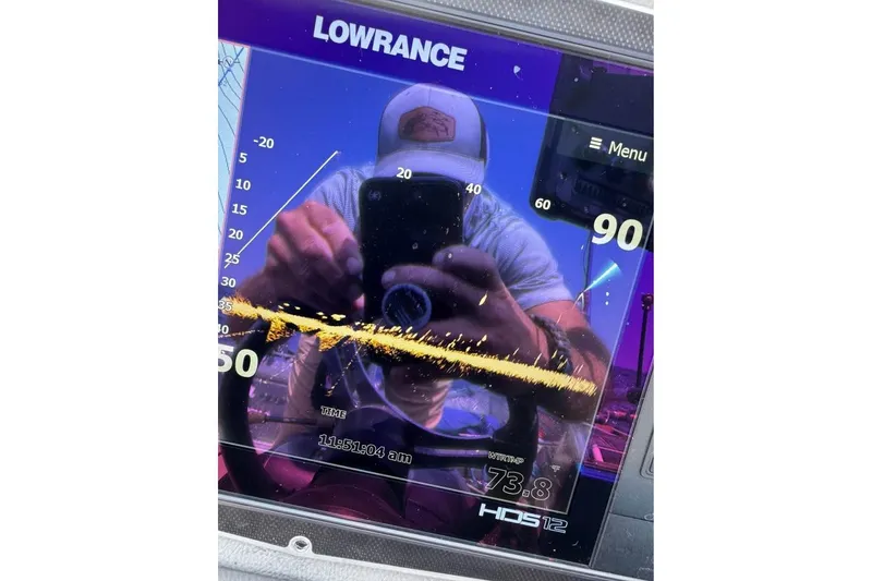 Slide: The Image of Reflection on Lowrance fishfinder screen in Ranger 622FS Pro Touring boat. - 5