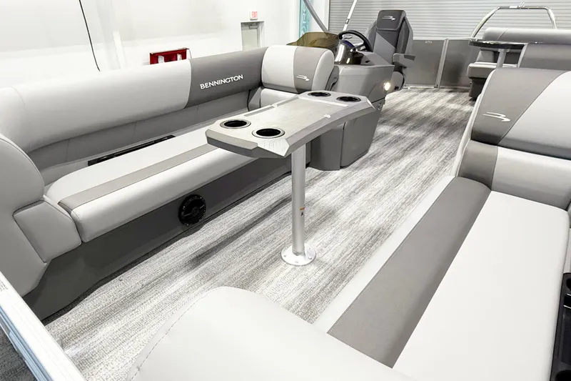 Slide: The Image of 2025 Bennington 21S Cruise interior with plush seating and modern design. - 10