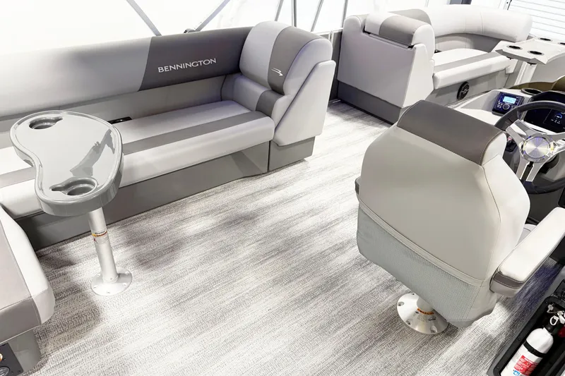 Slide: The Image of 2025 Bennington 21S Cruise interior with plush seating and modern helm. - 6