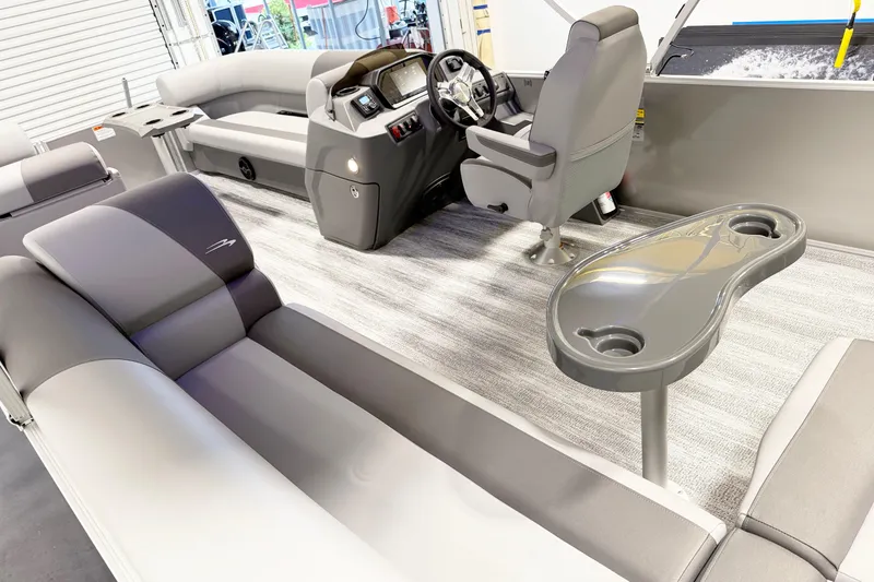 Slide: The Image of Interior of 2025 Bennington 21S Cruise pontoon boat with modern seating and helm. - 7