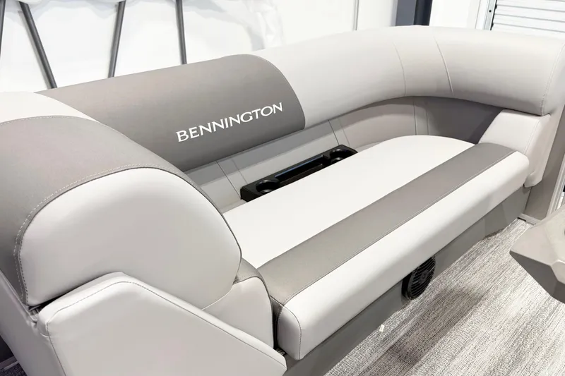 Slide: The Image of 2025 Bennington 21S Cruise boat interior with gray and white seating. - 9