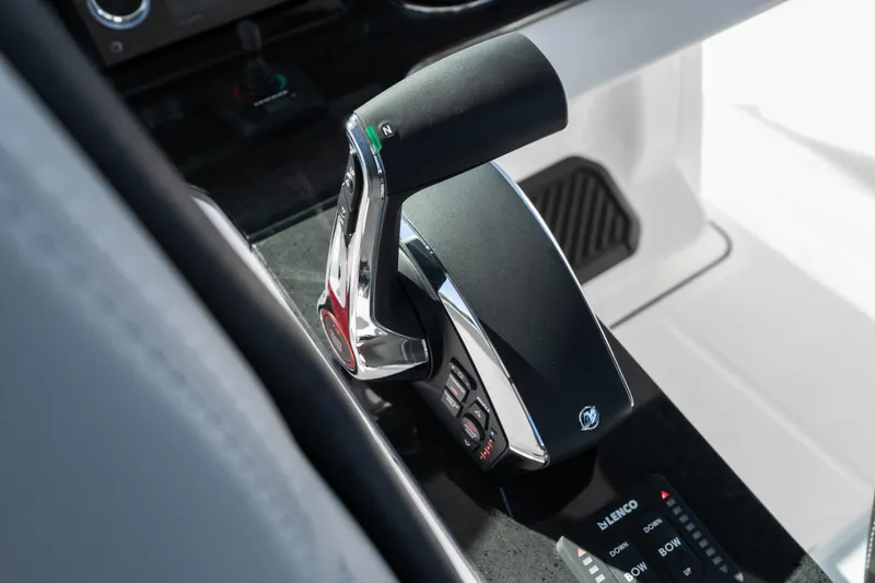 Slide: The Image of Throttle control of 2026 Monterey Elite 27 SD boat, featuring sleek design and modern controls. - 18