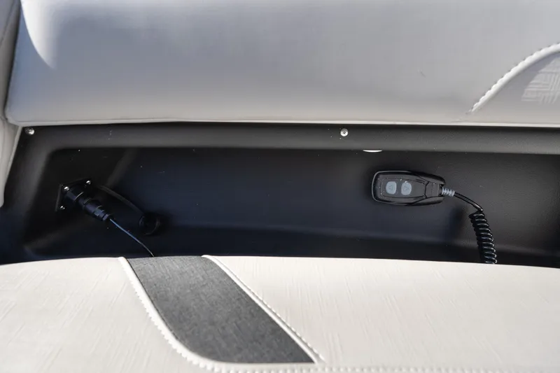 Slide: The Image of Interior view of 2026 Monterey Elite 27 SD boat, featuring control panel and seating. - 20