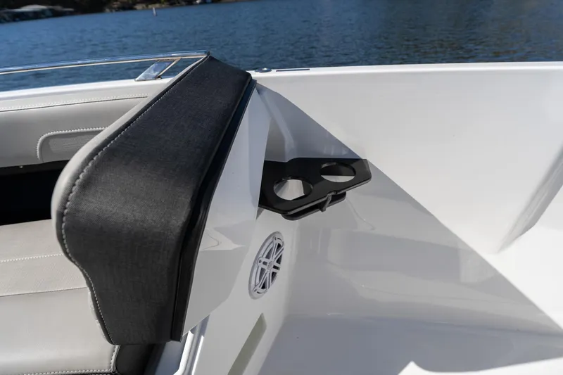Slide: The Image of Interior of 2026 Monterey Elite 27 SD boat with cup holders and seating. - 23