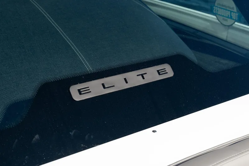 Slide: The Image of 2026 Monterey Elite 27 SD boat with "Elite" emblem on windshield. - 24