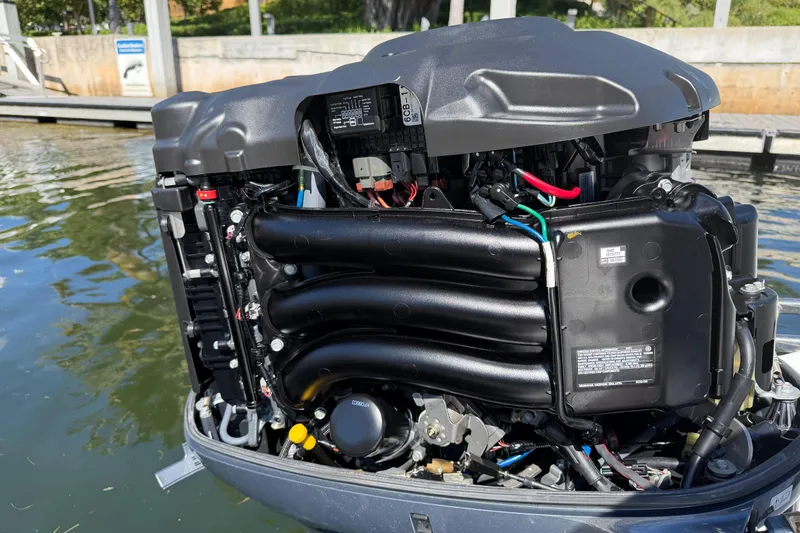 Slide: The Image of 2023 Tidewater 232 LXF boat engine, detailed view, dockside. - 27