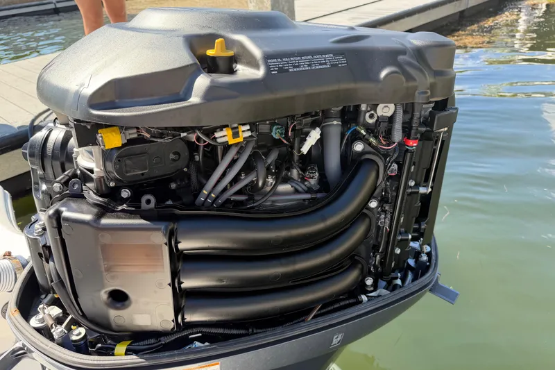 Slide: The Image of 2023 Tidewater 232 LXF boat engine, detailed view at dockside. - 28