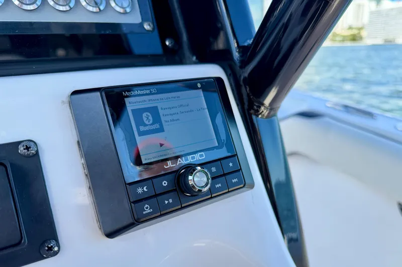 Slide: The Image of JL Audio system on 2023 Tidewater 232 LXF boat, displaying Bluetooth connection. - 9