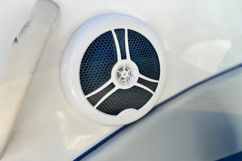 Slide: The Image of White speaker on 2006 Bayliner 215 Bowrider boat interior. - 20