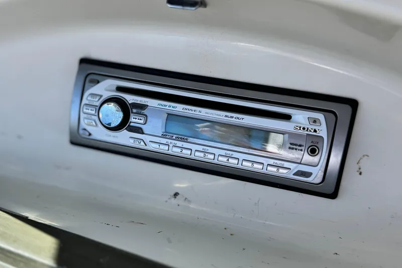 Slide: The Image of Sony marine stereo system on a 2006 Bayliner 215 Bowrider boat dashboard. - 22