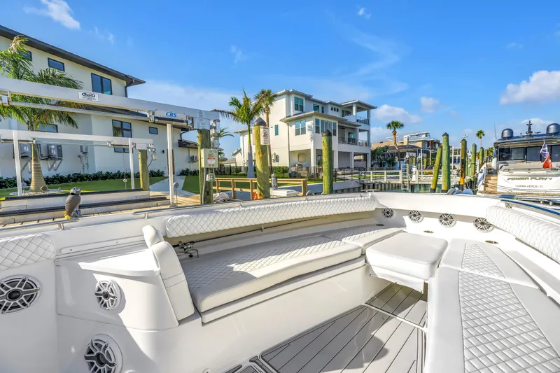 Slide: The Image of Luxurious 2023 HCB 53 Suenos RXV boat interior at a sunny marina. - 102