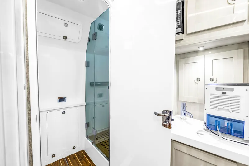 Slide: The Image of Luxurious bathroom interior of 2023 HCB 53 Suenos RXV yacht with modern shower and cabinetry. - 114