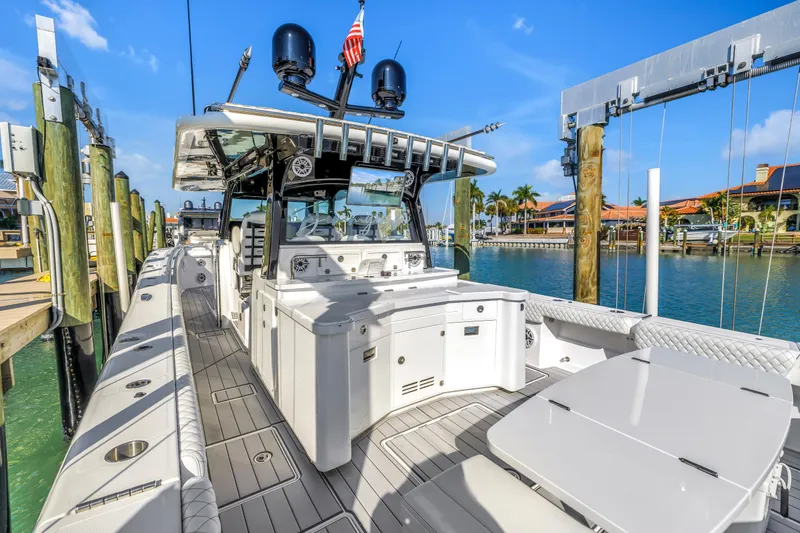 Slide: The Image of 2023 HCB 53 Suenos RXV luxury boat docked, featuring sleek design and modern amenities. - 64