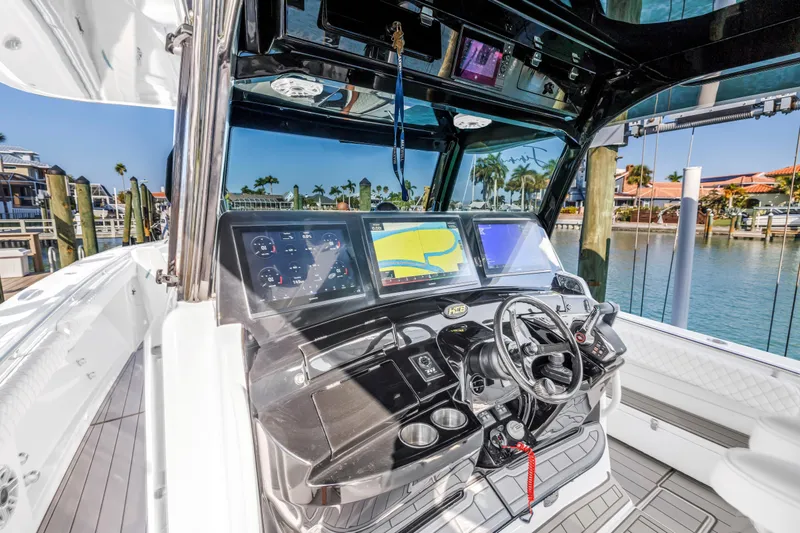 Slide: The Image of 2023 HCB 53 Suenos RXV boat dashboard with advanced navigation displays. - 87