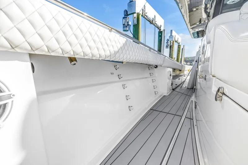 Slide: The Image of 2023 HCB 53 Suenos RXV boat deck with sleek white interior and modern design. - 91