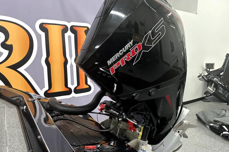 Slide: The Image of 2022 Ranger Z521L boat with Mercury Pro XS engine in showroom. - 19