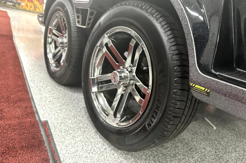 Slide: The Image of 2022 Ranger Z521L trailer with shiny chrome wheels and Michelin tires. - 25