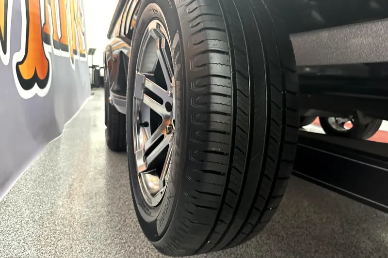 Slide: The Image of 2022 Ranger Z521L tire close-up on showroom floor. - 36